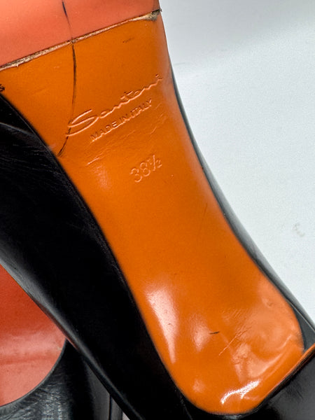 Décolleté in pelle nera con plateau