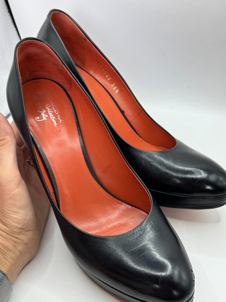 Décolleté in pelle nera con plateau