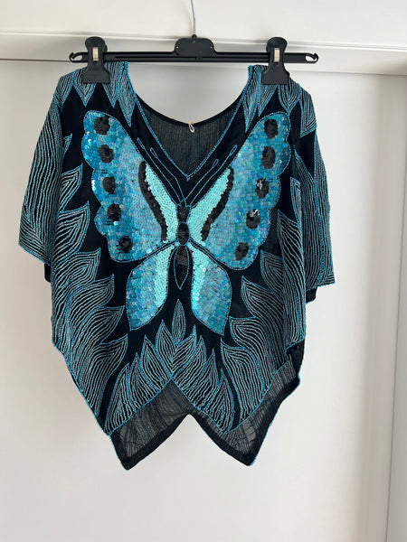 Blusa con farfalle e paillettes