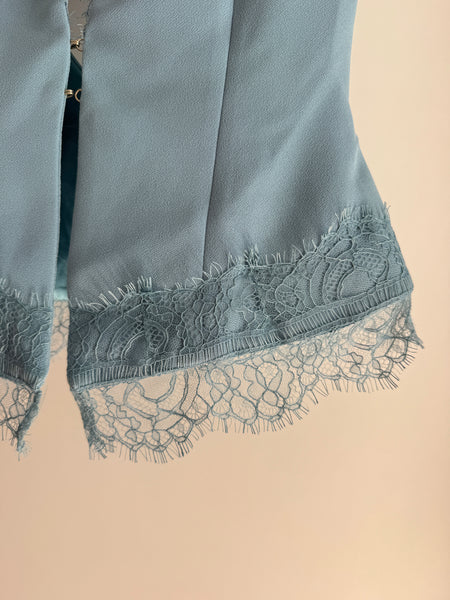 Top/Giacca corta con schiena scoperta